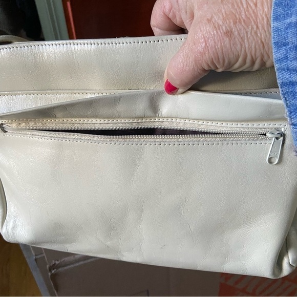 Leather shoulder handbag has 5 compartments that zip or snap for easy access. - Picture 4 of 8
